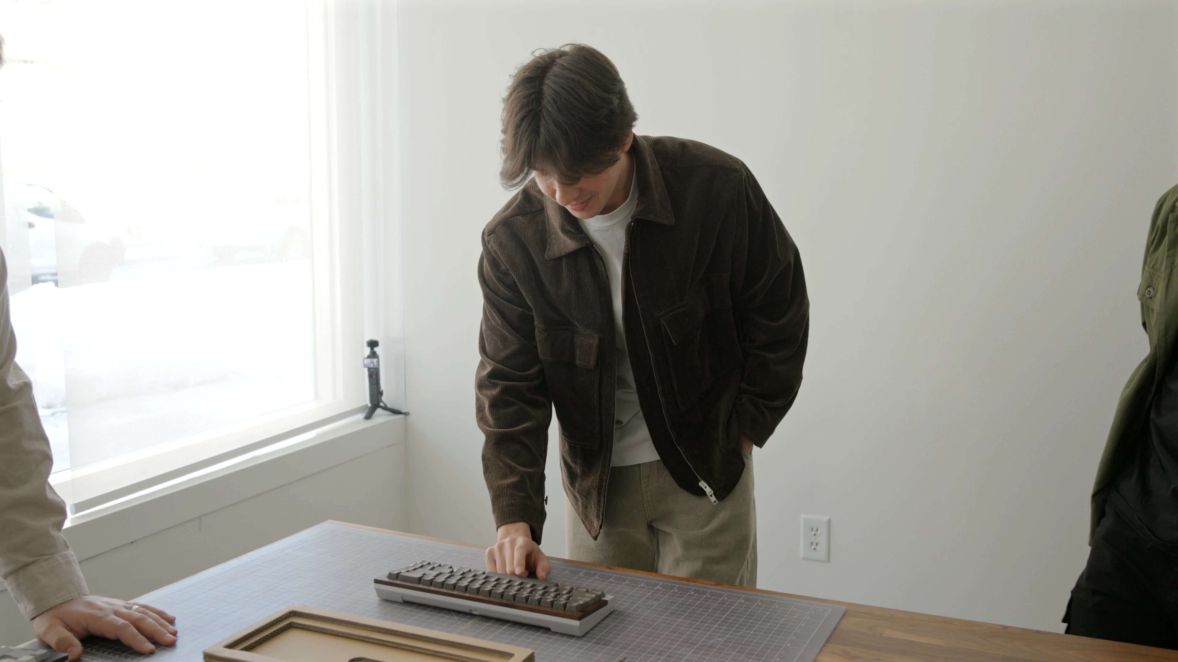 Team members testing the Crown Mounting System prototype in Boston