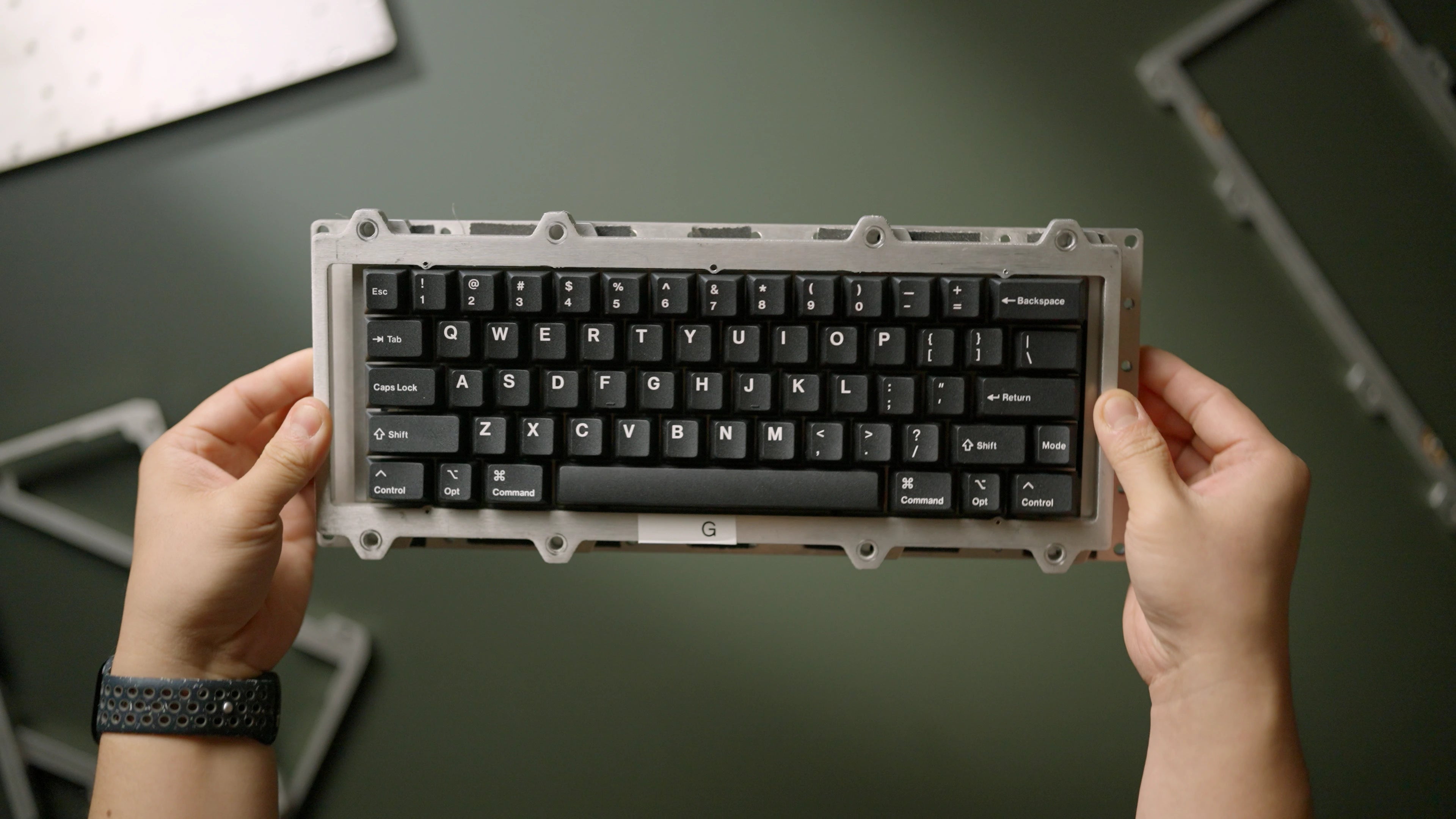 Three-piece modular test board used to evaluate mounting systems