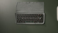The plate foam on the PCB after the spacebar section has been trimmed off.