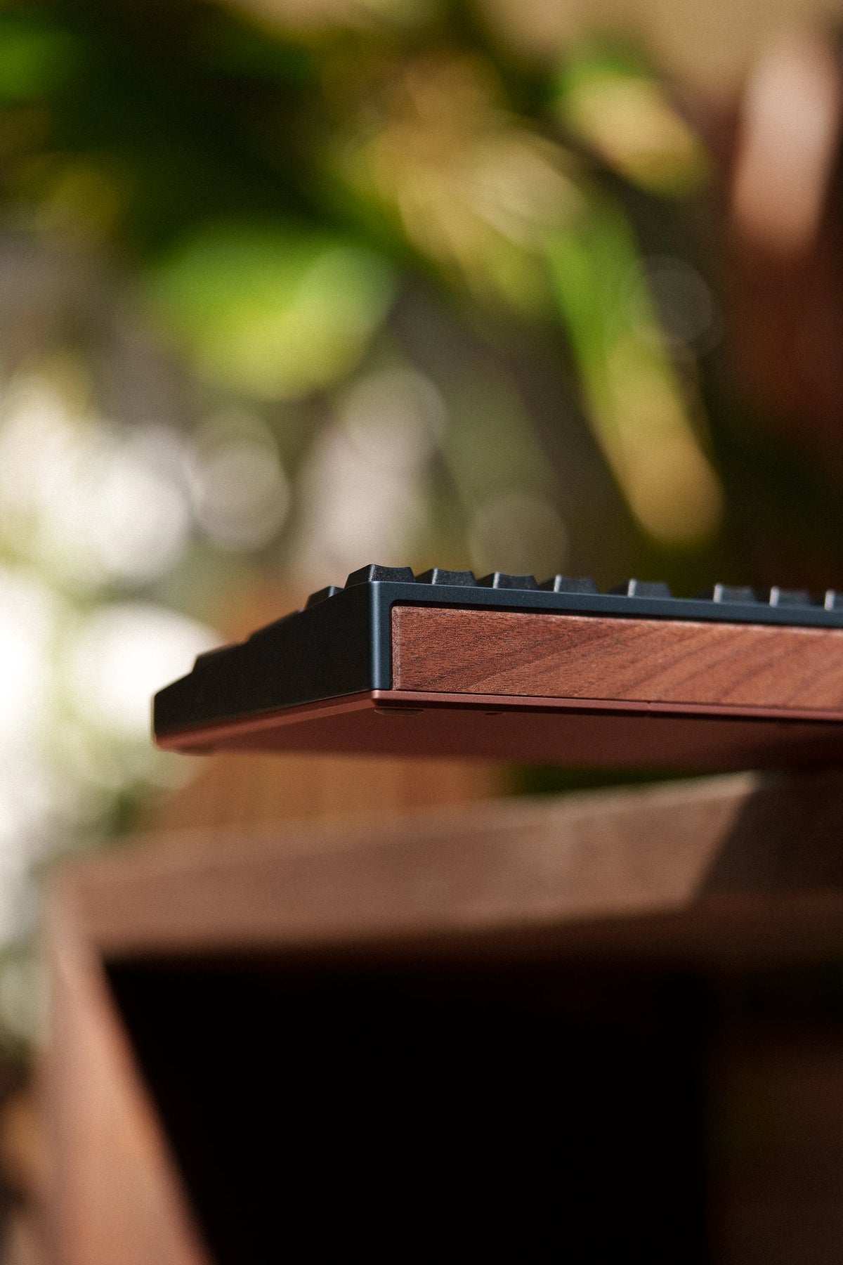 Walnut accent on the back of a Mode Prologue in Blue Mocha
